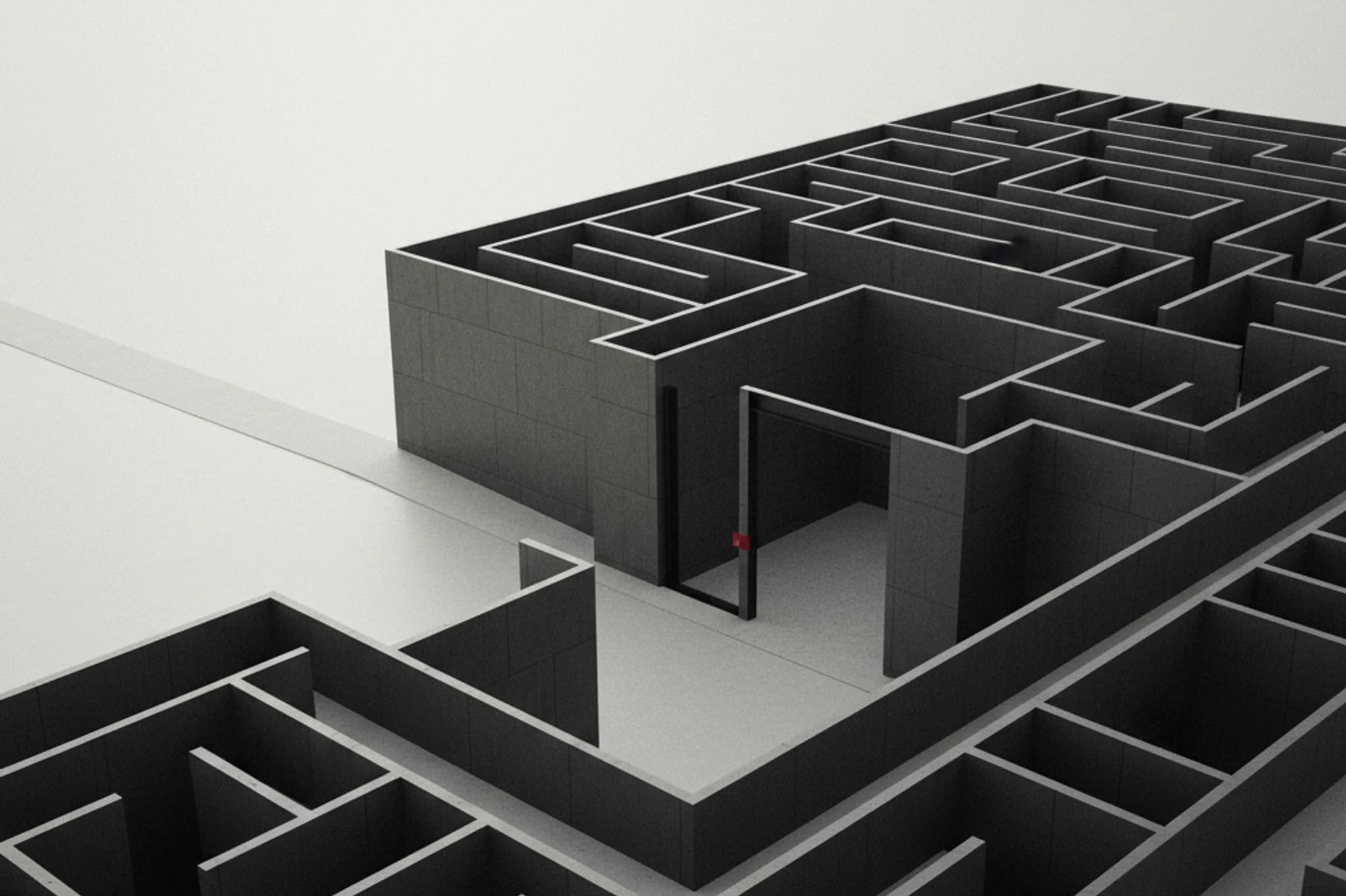 Slightly elevated view of a precise graphite-concrete and blackened-steel architectural labyrinth converging toward a central structure, with one subtle open path leading toward a pale daylight horizon